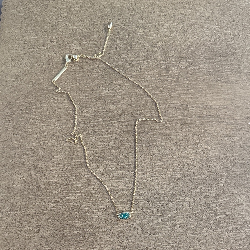 Kendra Scott adjustable Gold Necklace with green mini Pendant